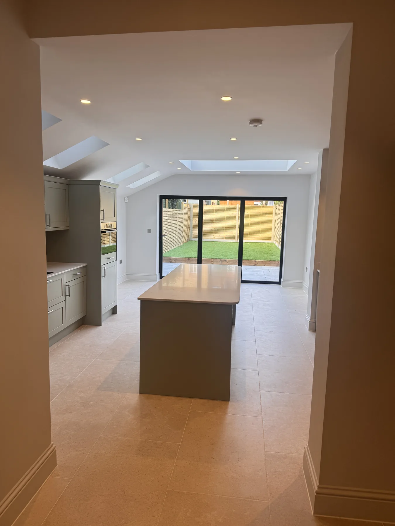 Completed open-plan kitchen and rear extension in a whole-house renovation in Wimbledon SW19